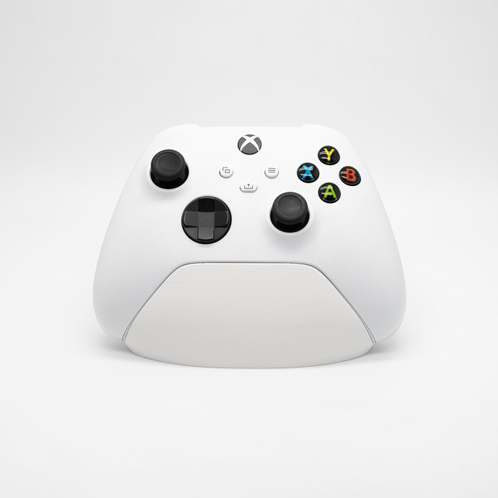 Magicland 3D beyaz Xbox kontrolcü standı, sade ve fonksiyonel tasarım, gaming setup aksesuarı.