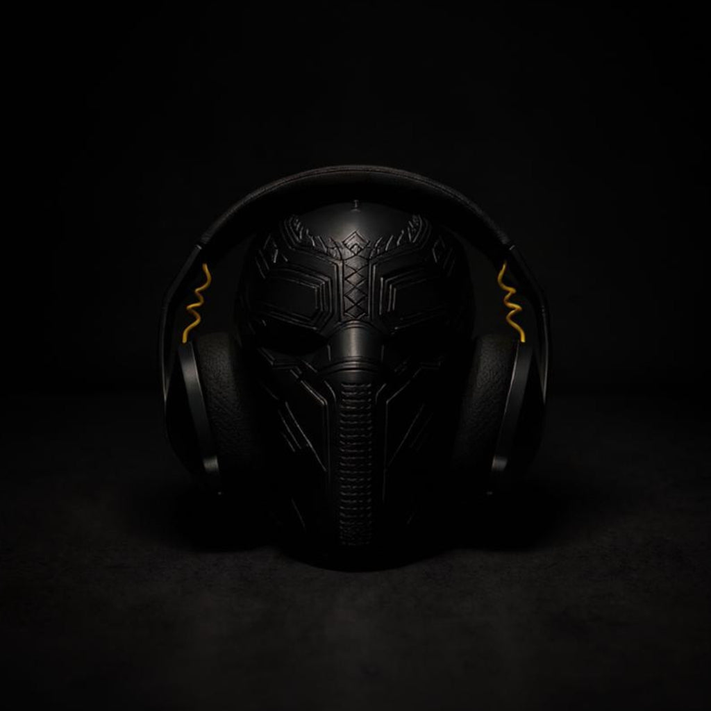 Magicland 3D Black Panther mask headphone stand with gold accents, made of black material.