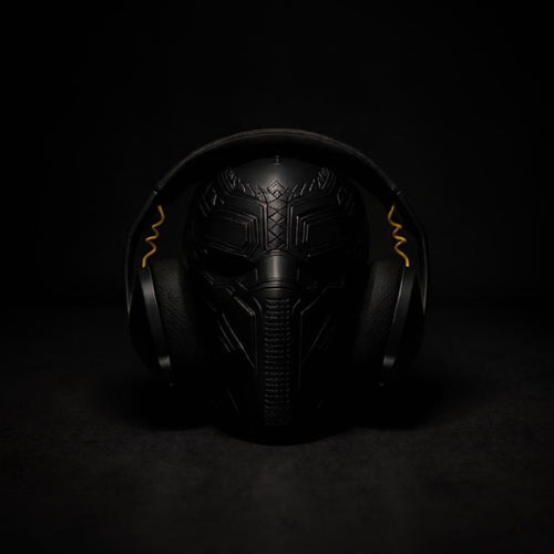 Magicland 3D Black Panther mask headphone stand with gold accents, made of black material.