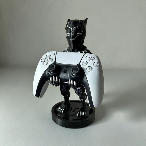 Magicland 3D Black Panther figürlü oyun kolu tutacağı, PS5 ve Xbox kolları için ideal, siyah ve gümüş detaylı.