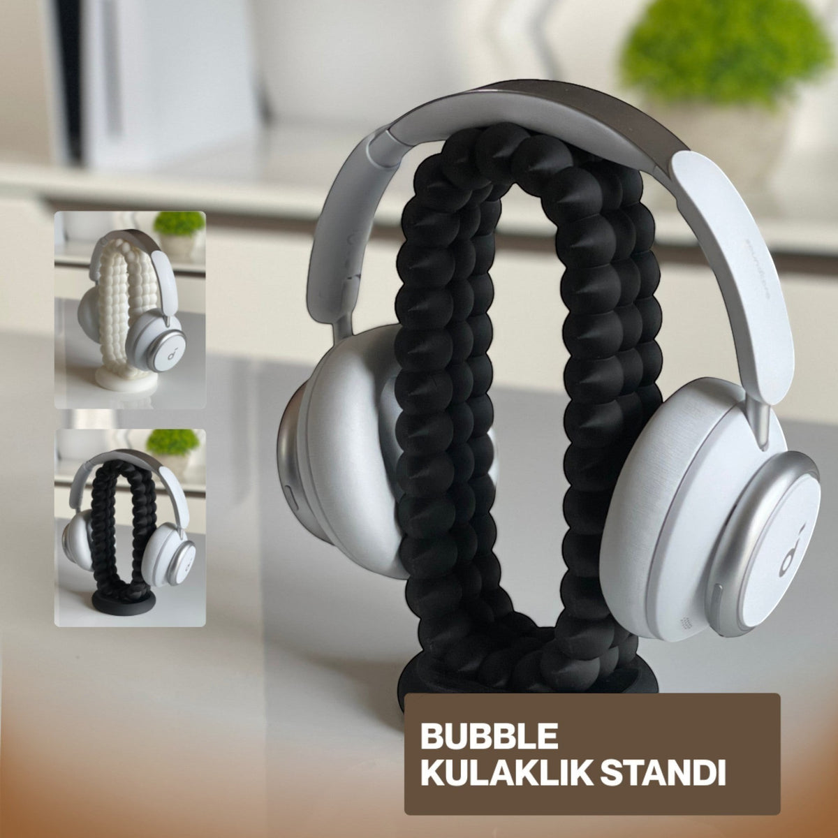 Magicland 3D bubble headphone stand in black, holding white headphones. Unique flexible design.
