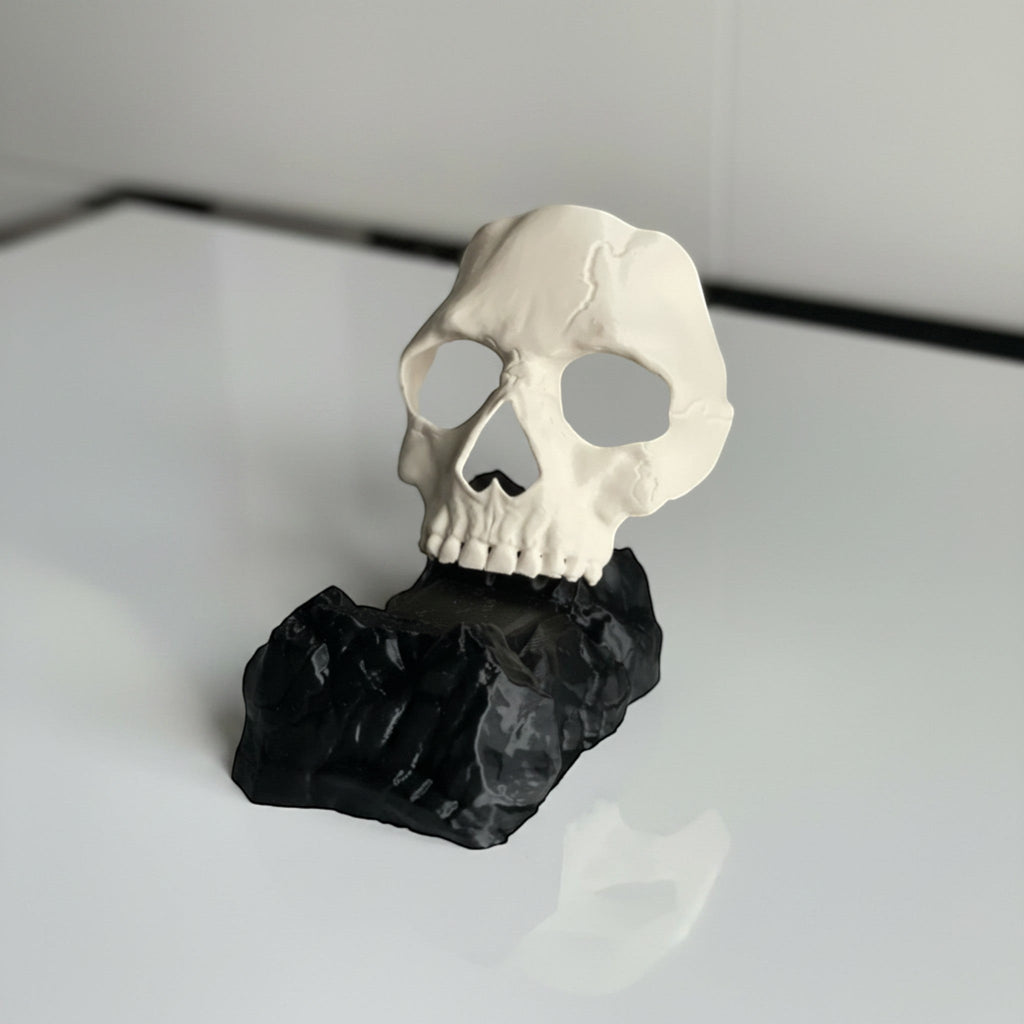Magicland 3D Call of Duty Ghost skull stand, off-white skull on black rock base.