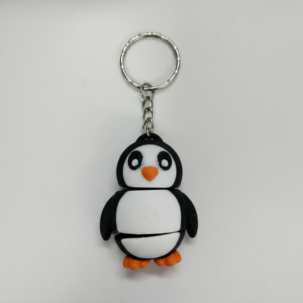 Magicland 3D sevimli penguen tasarımlı, siyah beyaz ve turuncu renkli, anahtarlık.