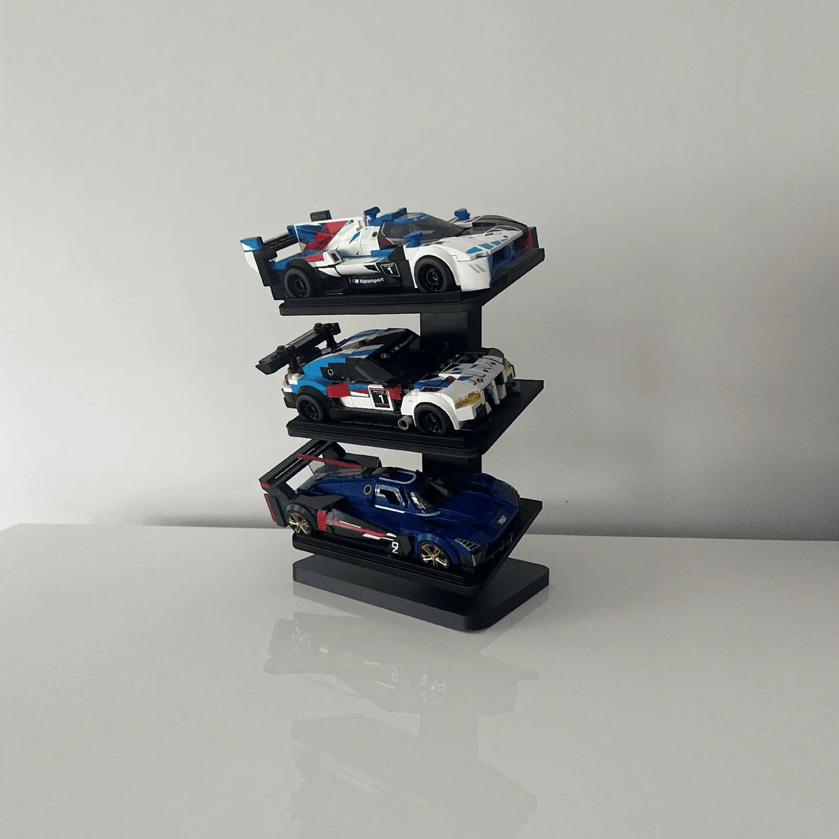 Magicland 3D siyah üç katlı dikey Lego Speed Champions araç sergileme standı
