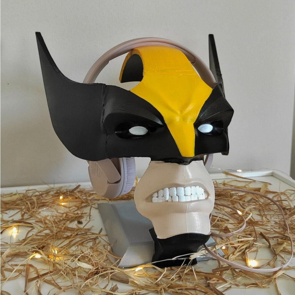 Magicland 3D Wolverine kulaklık standı, sarı ve siyah renklerde, kulaklıkları tutmak için tasarlanmış.