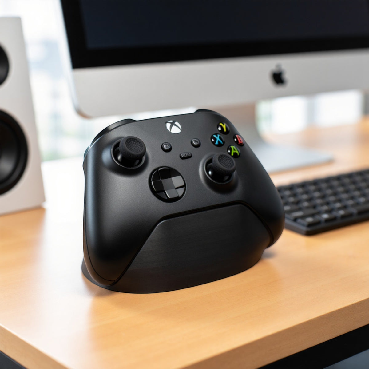 Magicland 3D siyah Xbox kontrolcü standı, sade ve fonksiyonel tasarım, gaming setup aksesuarı.