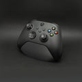 Magicland 3D siyah Xbox kontrolcü standı, oyun kurulumu için sade ve fonksiyonel aksesuar.