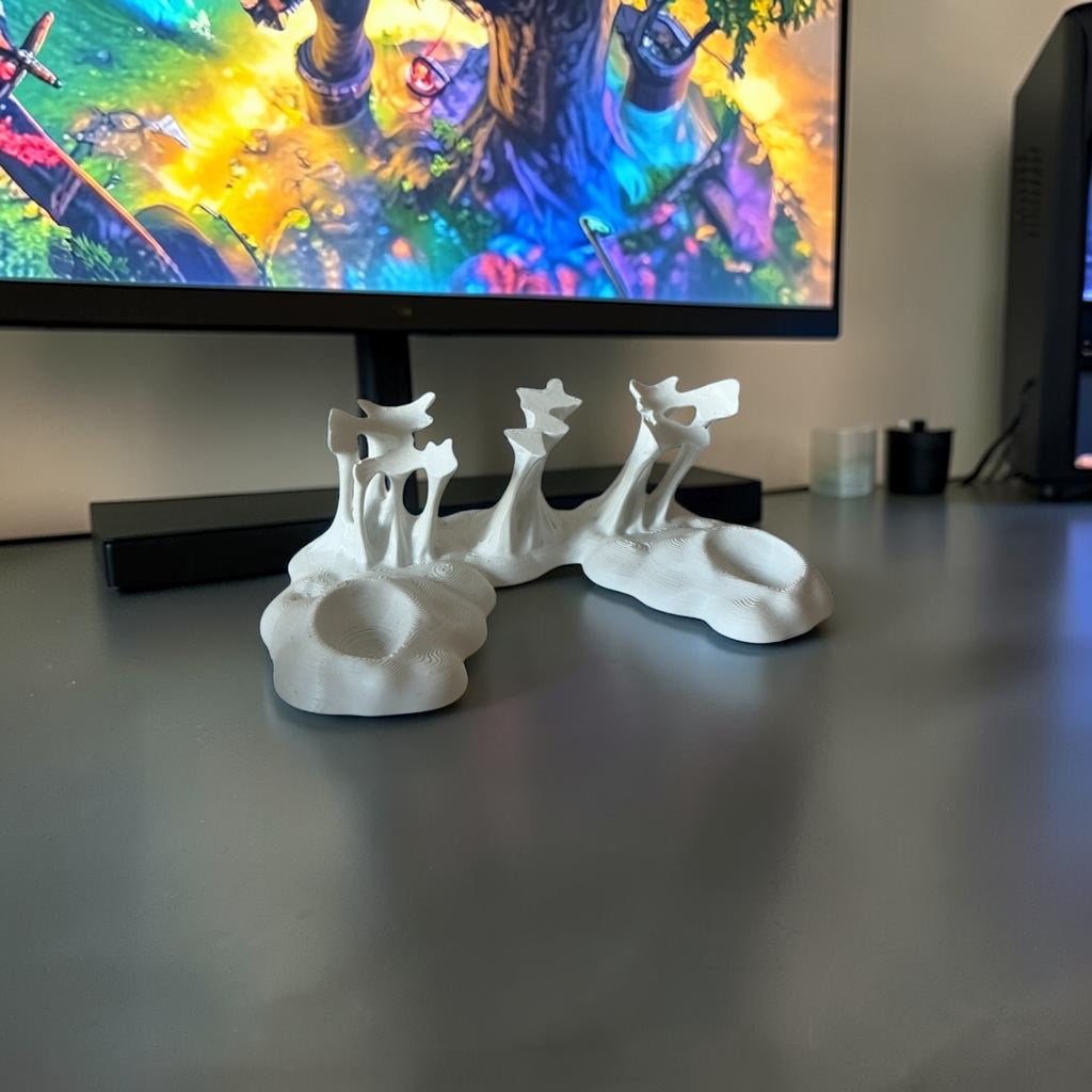 Magicland 3D abstract grey decorative stand with organic, flowing lines and textured surfaces.