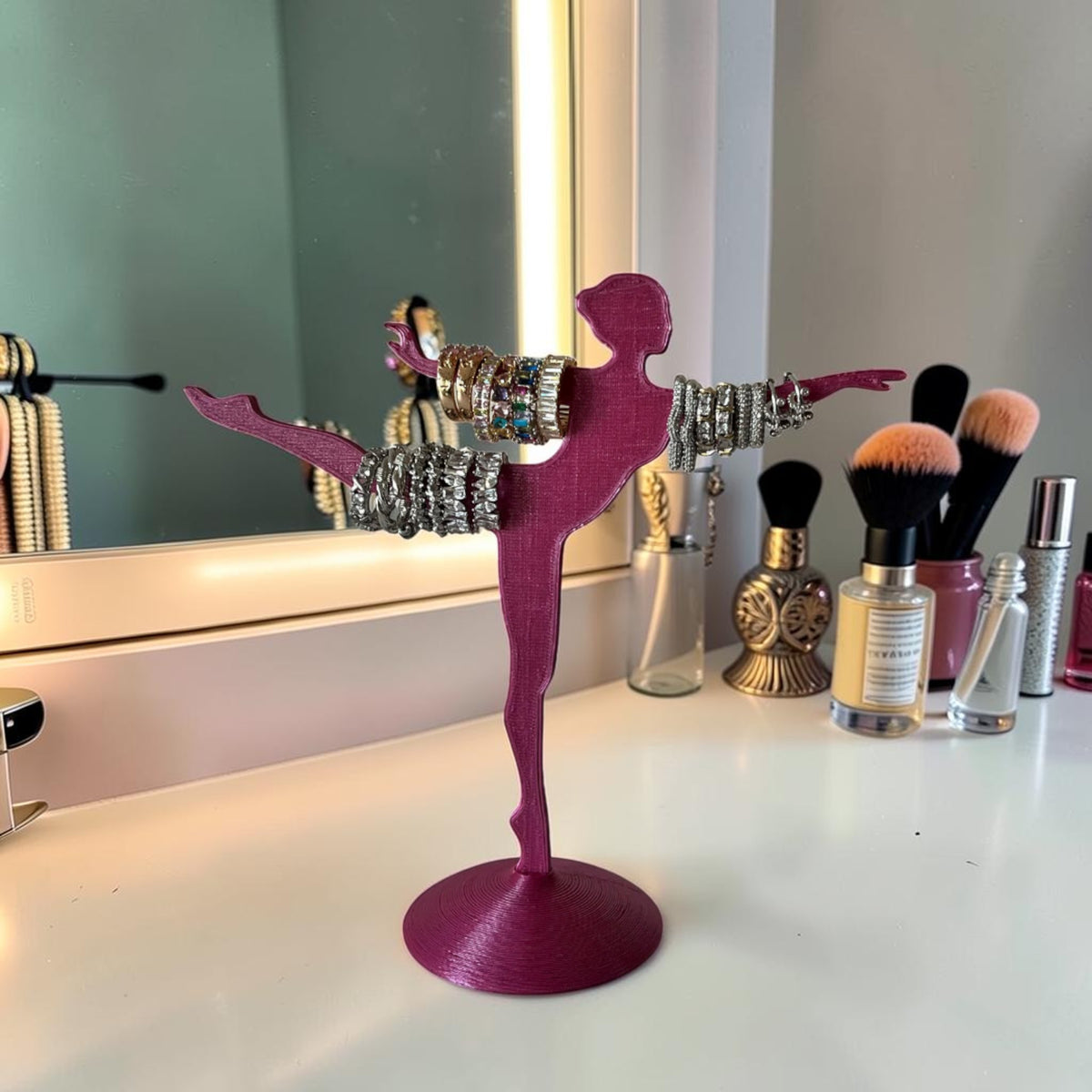 Magicland 3D fuchsia ballerina jewelry stand holding bracelets and rings. Decorative 3D printed stand.