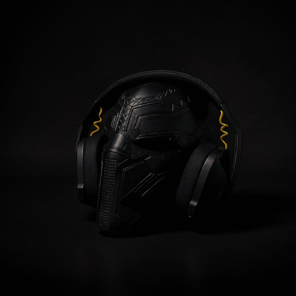 Magicland 3D Black Panther mask headphone stand with yellow accents, ideal for gaming setups.