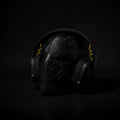 Magicland 3D Black Panther mask headphone stand with yellow accents, ideal for gaming setups.