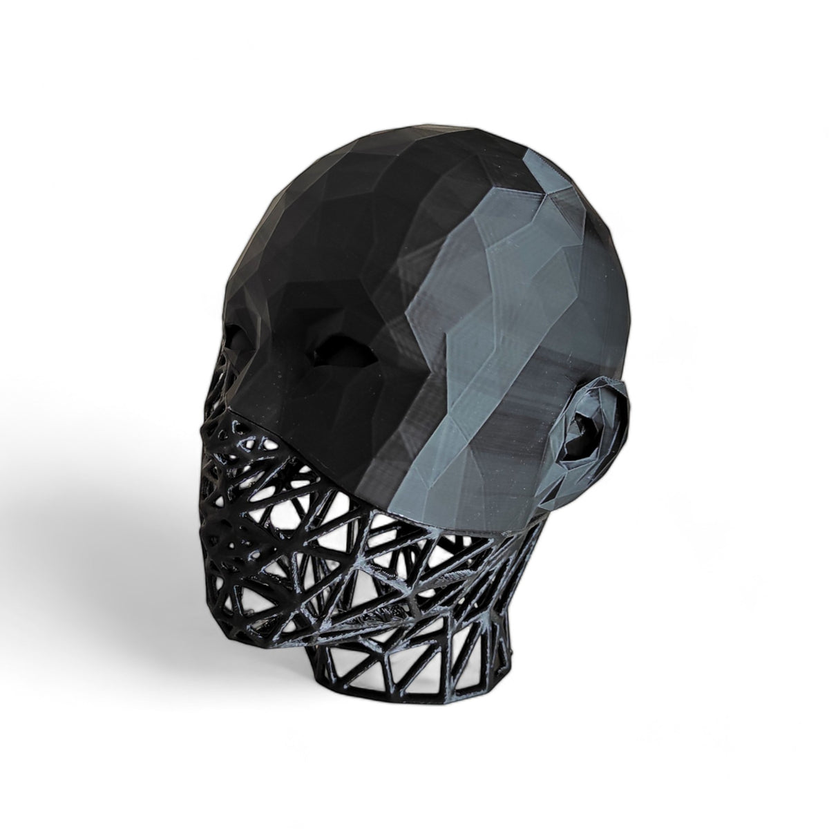 Magicland 3D black Voronoi patterned headphone stand shaped like a geometric head.