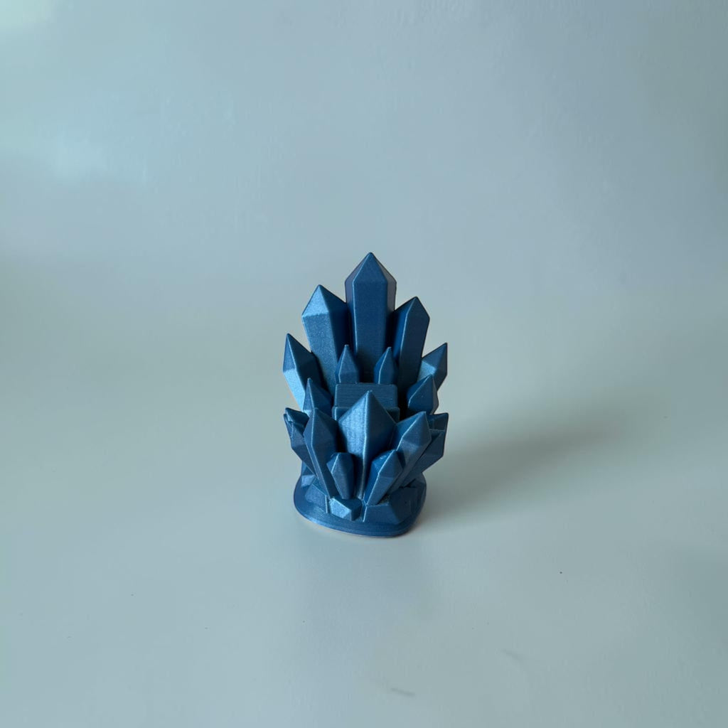 Magicland 3D blue crystal design decorative stand, metallic finish, geometric facets.