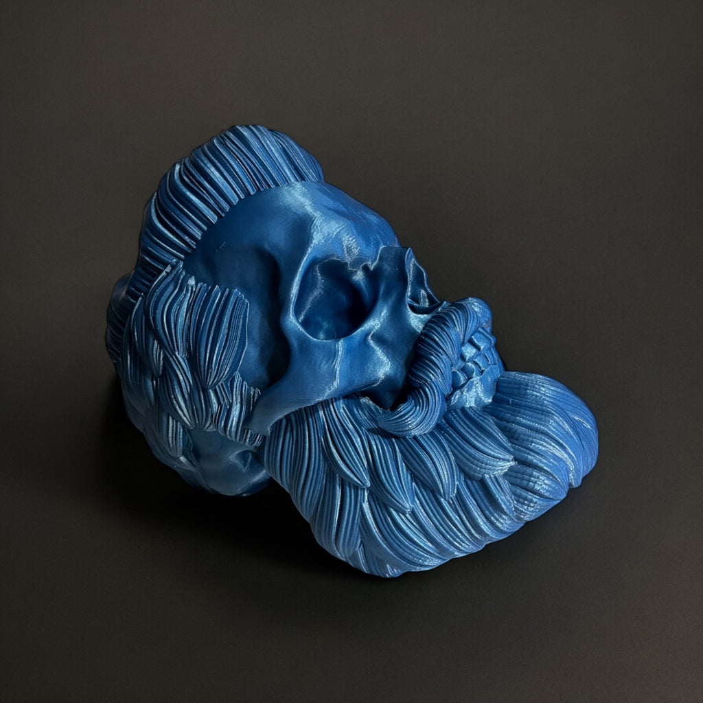 Magicland 3D blue metallic skull headphone stand with sculpted hair and beard detail