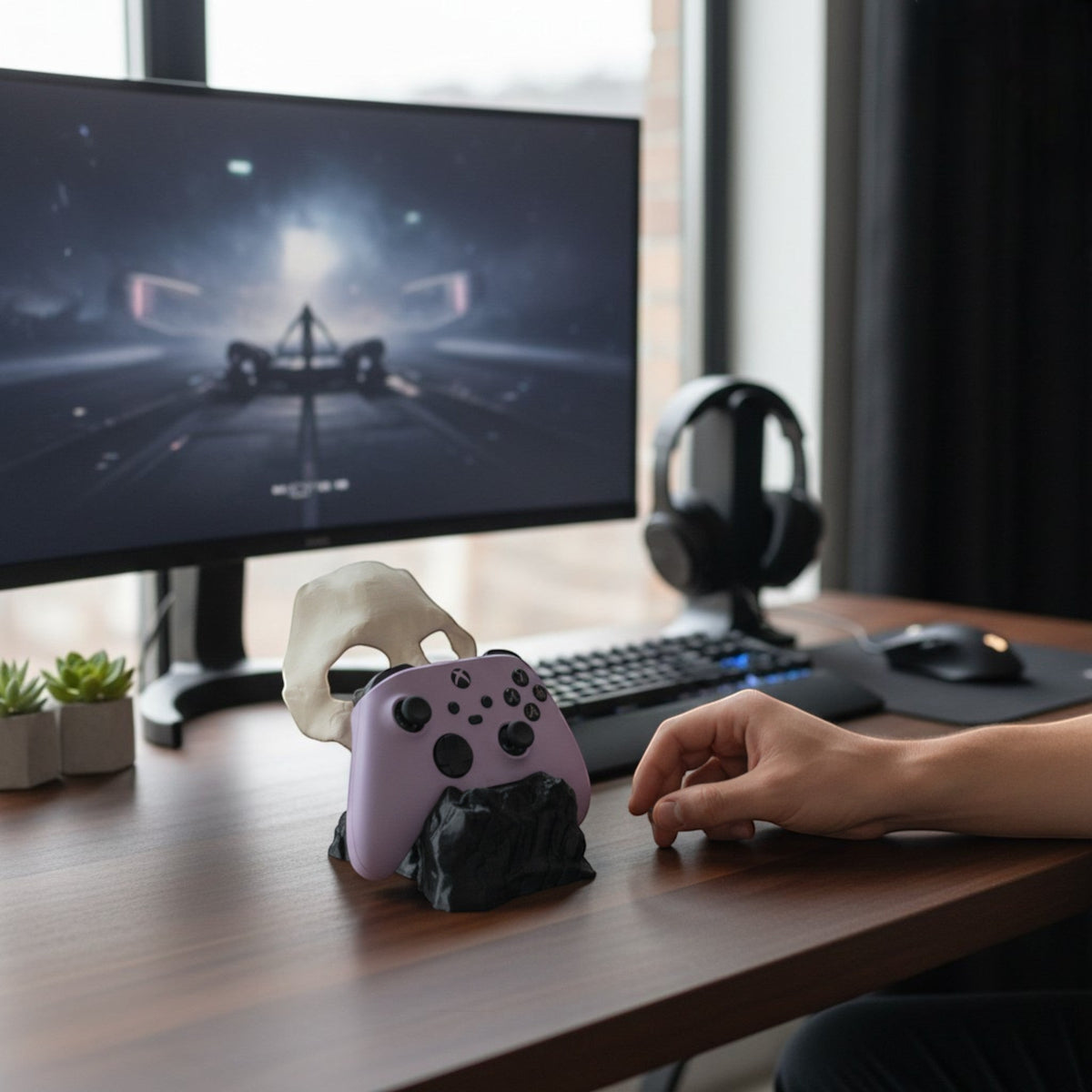 Magicland 3D Call of Duty Ghost skull controller stand, holding a purple Xbox controller.