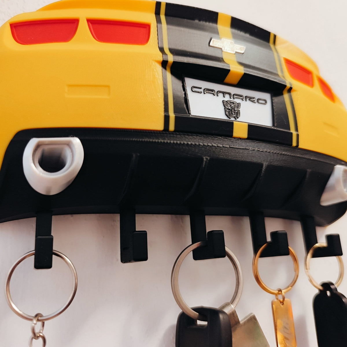 Magicland 3D yellow and black Chevrolet Camaro rear end key holder with 5 hooks.
