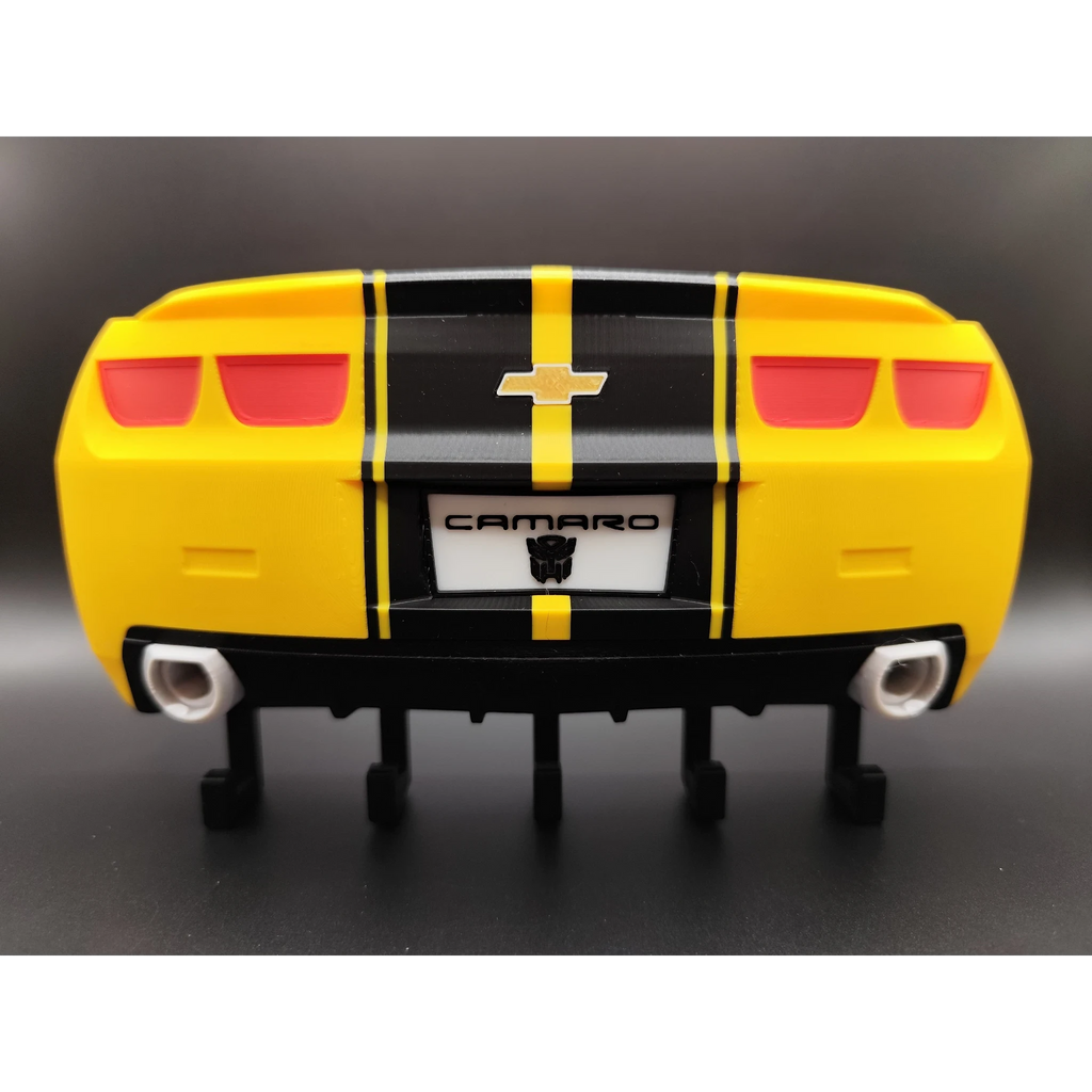 Magicland 3D Chevrolet Camaro yellow and black racing stripes key holder with hooks. Features red taillights and exhaust pipes.