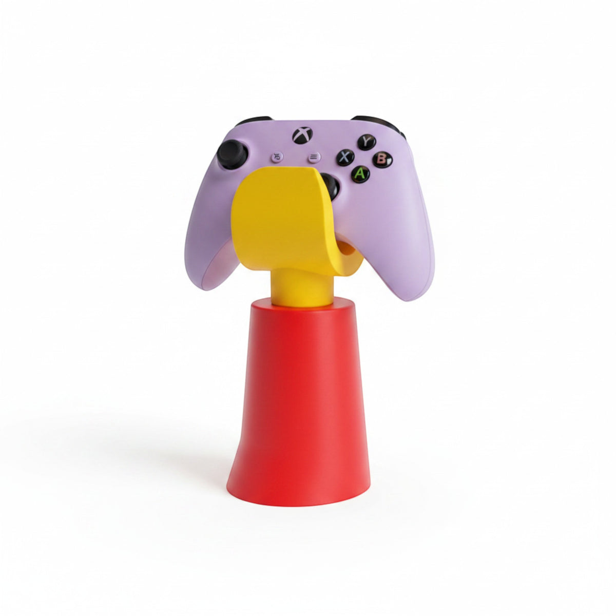 Magicland 3D hand-shaped controller stand in red and yellow, holding a lavender Xbox controller.