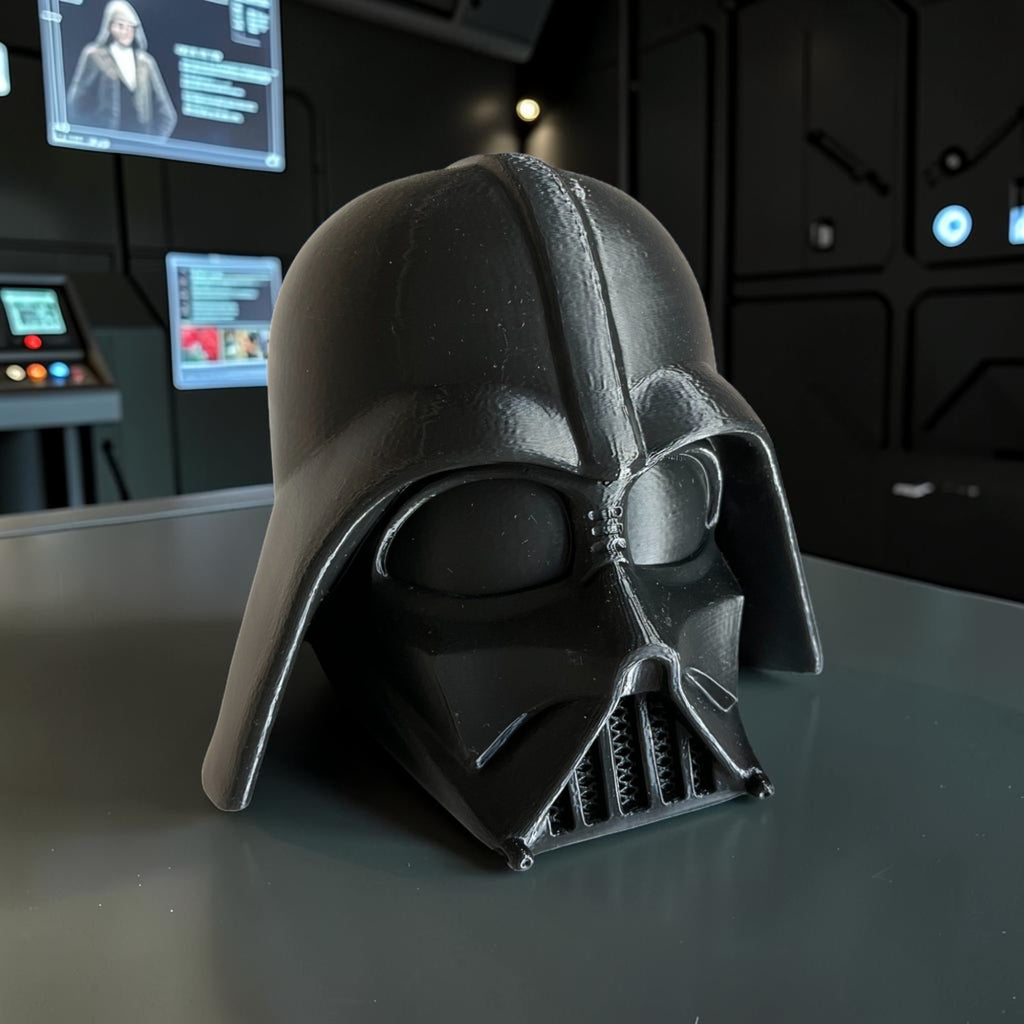 Magicland 3D Darth Vader helmet headphone stand, black plastic, iconic Star Wars design for desk organization.