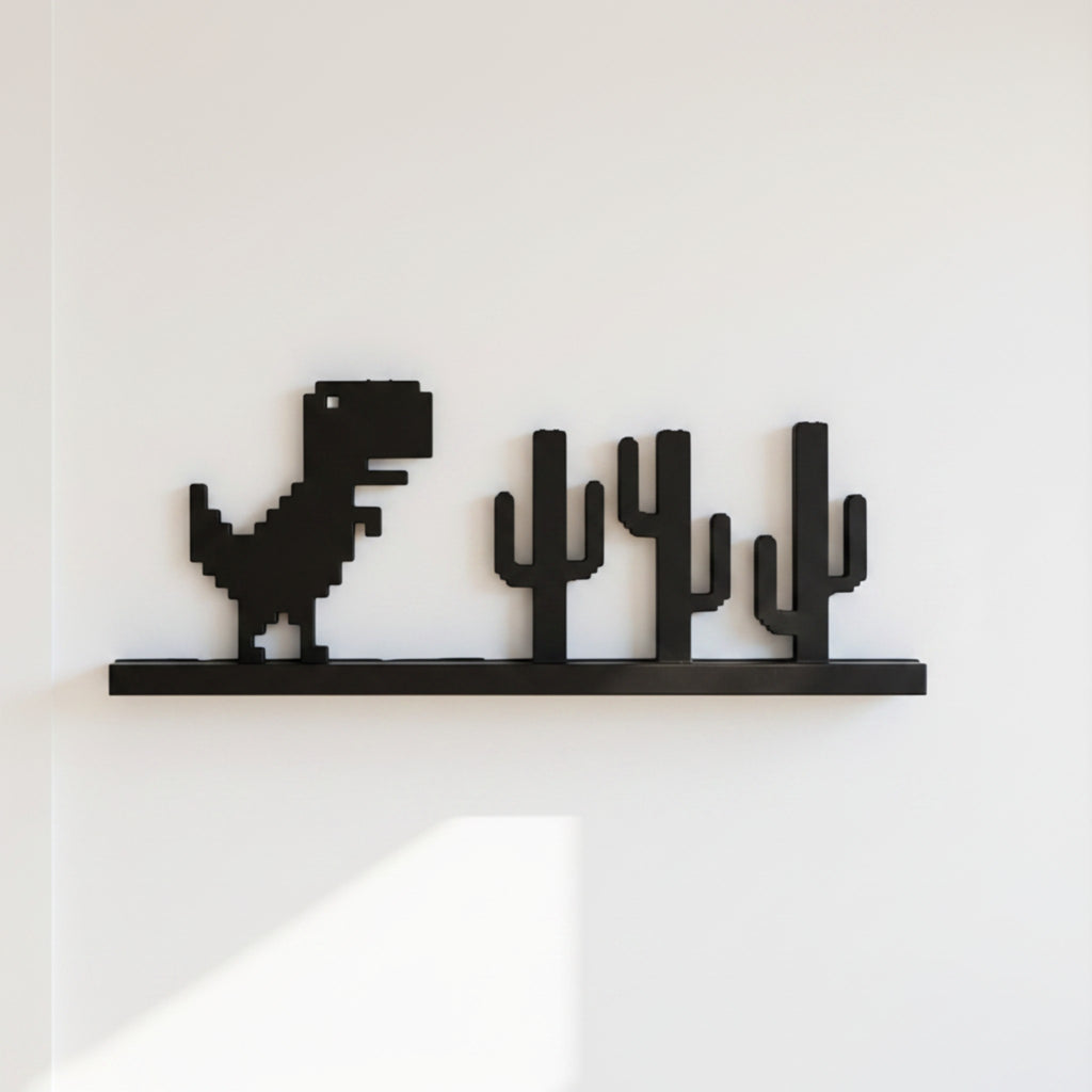 Magicland 3D black pixelated dinosaur and cactus decorative wall art.