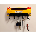 Magicland 3D yellow Ferrari Enzo rear end key holder with black accents and exhaust pipes. Holds four sets of keys.