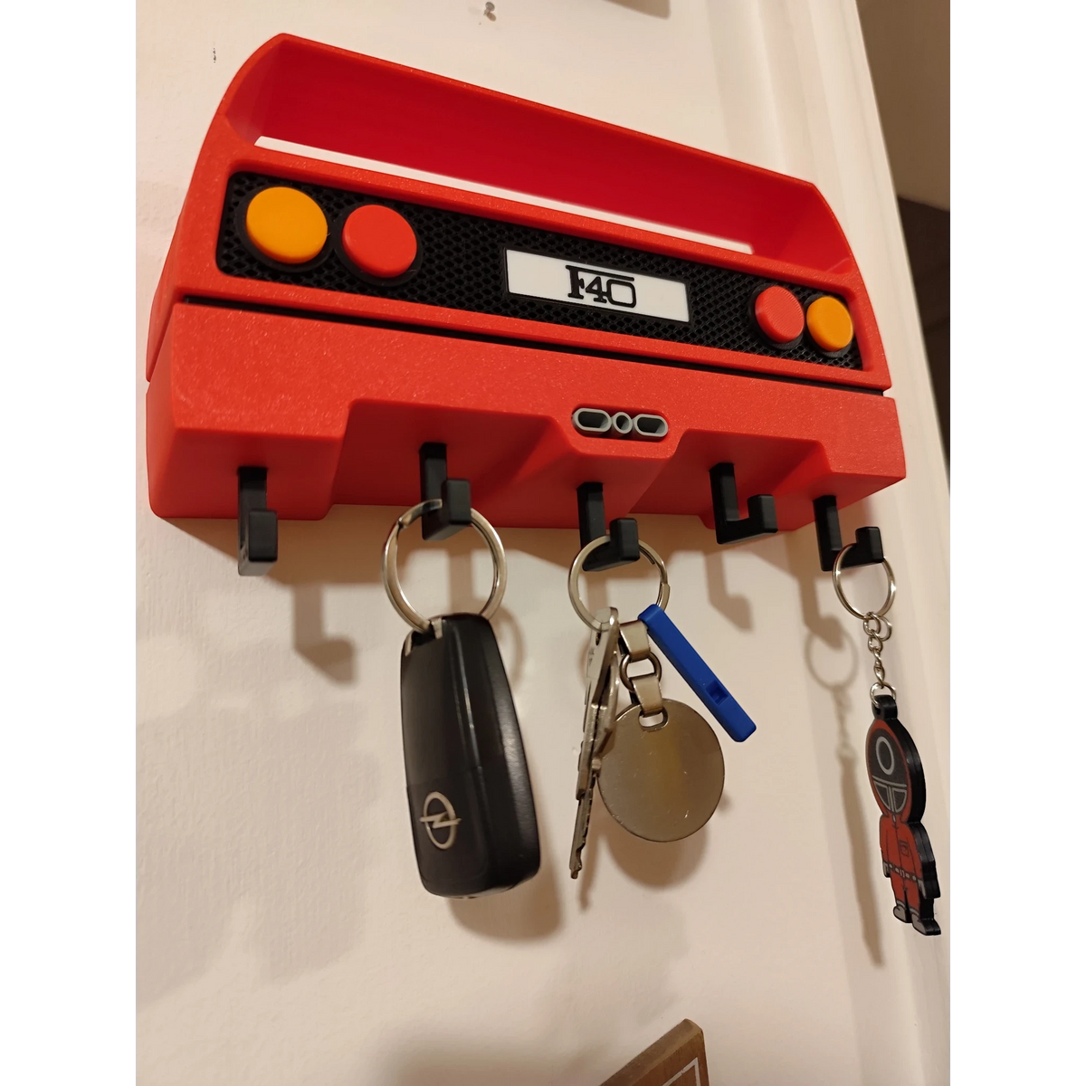 Magicland 3D red Ferrari F40 rear light design key holder with five hooks. Features F40 badge and orange/red tail lights.