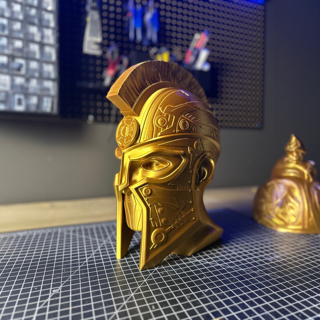 Magicland 3D gold gladiator helmet headphone stand with intricate detailing and a crest.