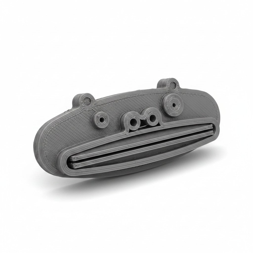 Magicland 3D grey pig-shaped toothpaste squeezer with slots for dispensing.