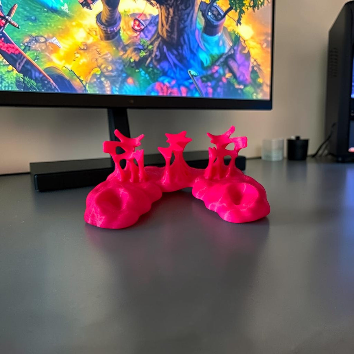 Magicland 3D hot pink abstract decorative phone stand with a unique, organic shape.