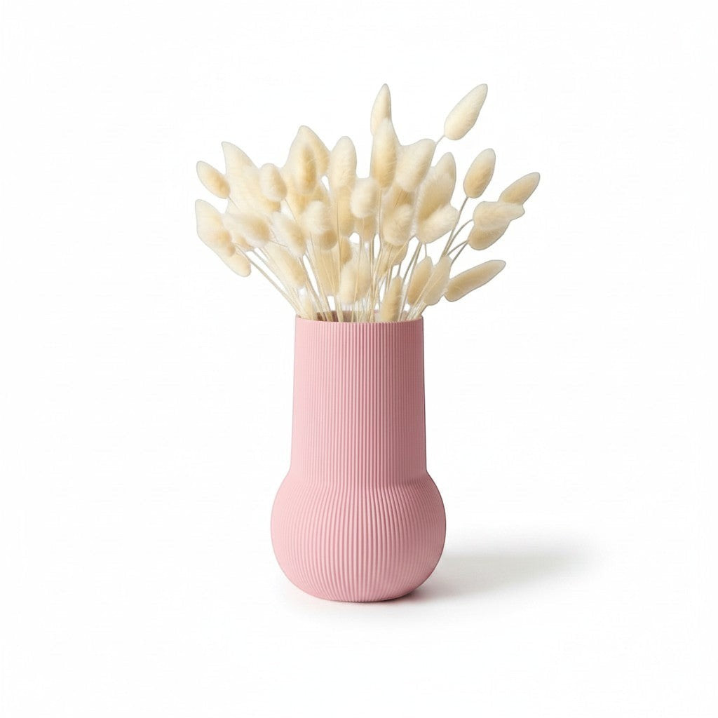 Magicland 3D pink ribbed decorative vase with dried bunny tail grass.