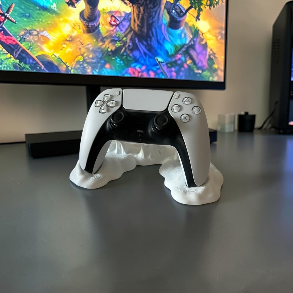 Magicland 3D white decorative stand for PlayStation 5 controller with a unique wavy design.