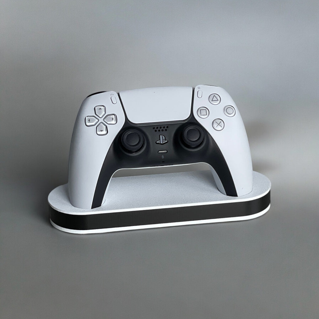 Magicland 3D minimalist white and black stand for PS5 controller, sleek design.