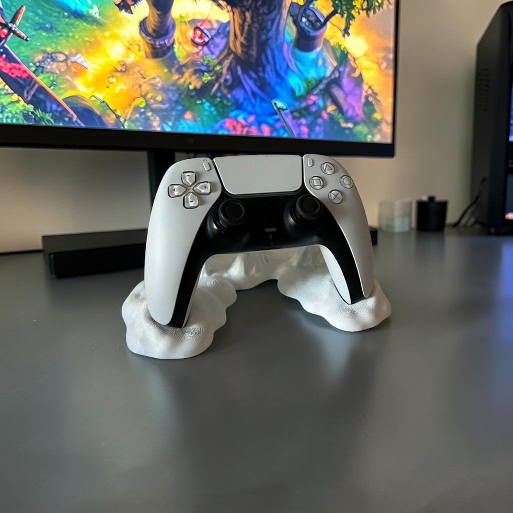 Magicland 3D white decorative stand for PlayStation 5 controller with a unique, textured design.