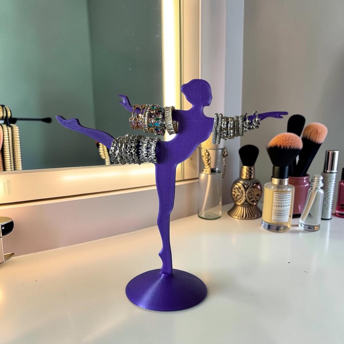 Magicland 3D purple ballerina jewelry stand holding bracelets and rings. Decorative 3D printed stand.