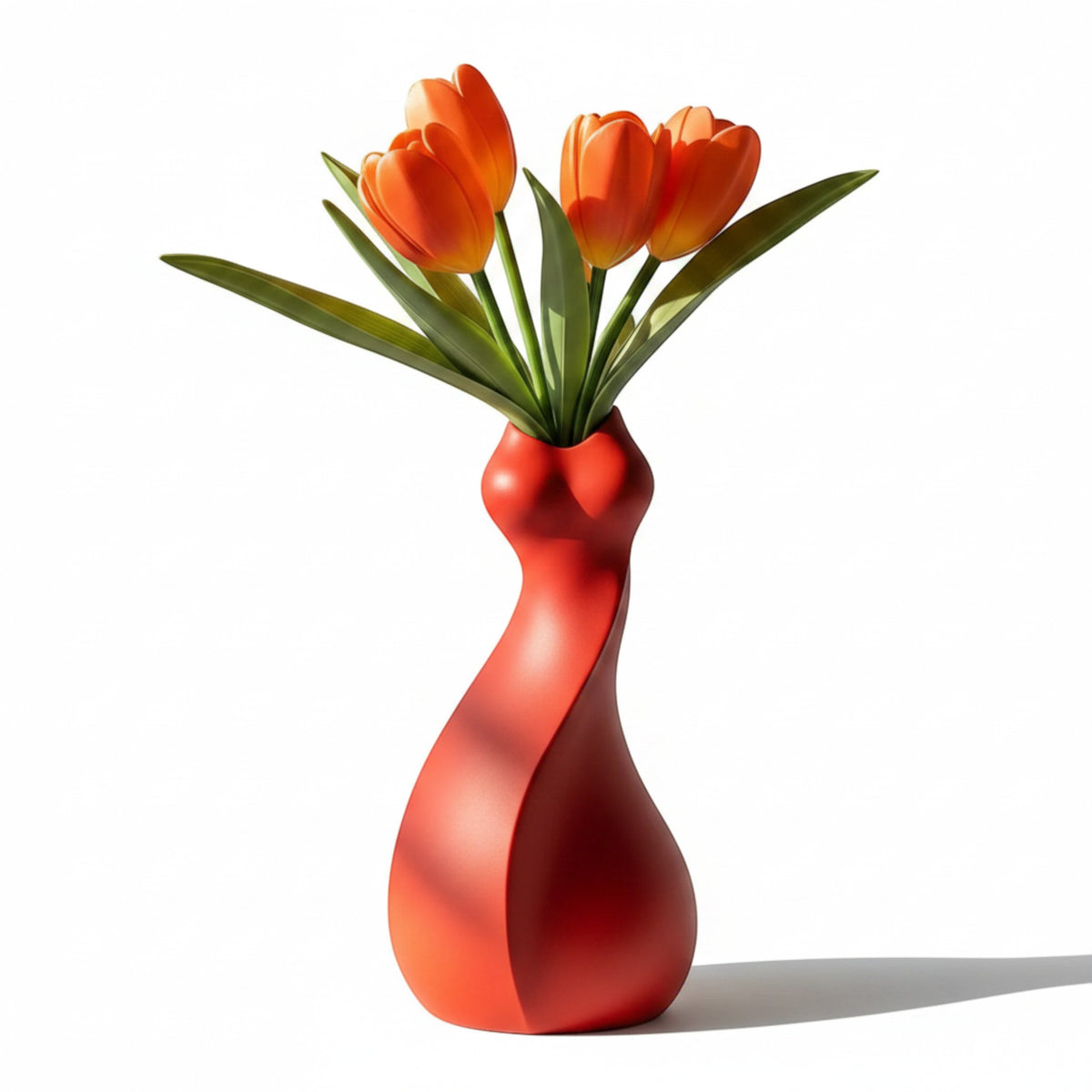 Magicland 3D red twisted decorative vase holding orange tulips and green leaves on a white background.