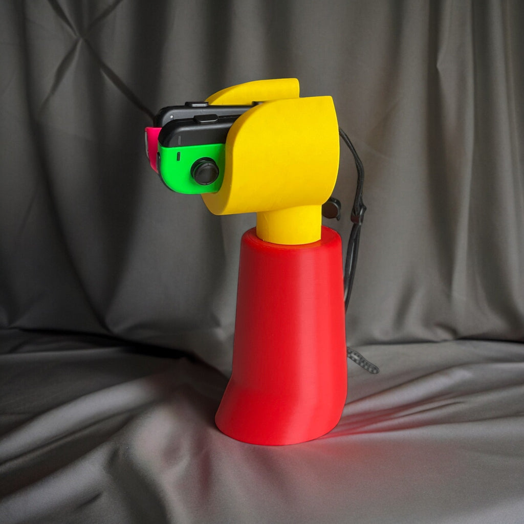 Magicland 3D red and yellow hand-shaped controller stand for Nintendo Switch Joy-Cons.