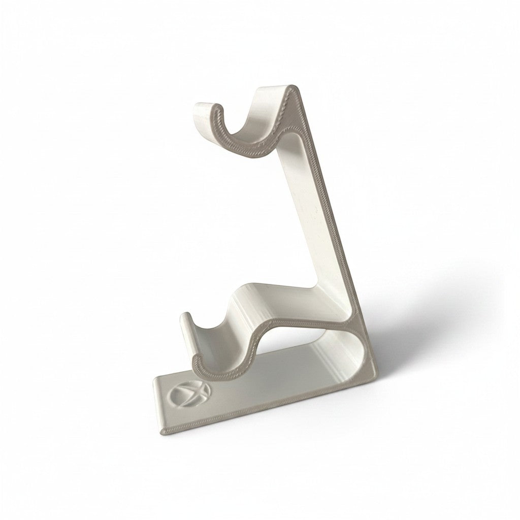 Magicland 3D white dual vertical Xbox controller stand with textured edges and embossed logo on base.