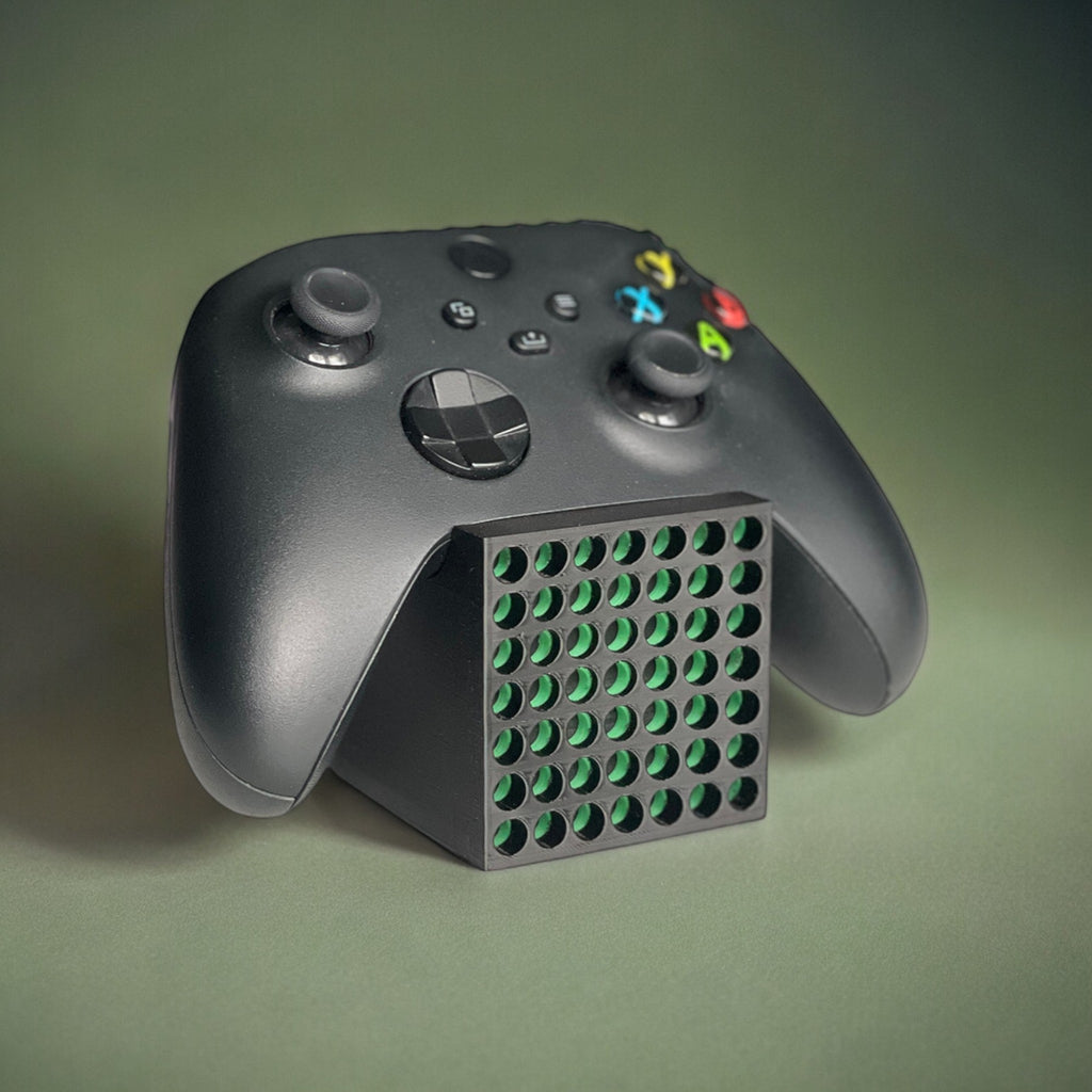 Magicland 3D Xbox Series X controller stand, black with green accents, holds one controller.