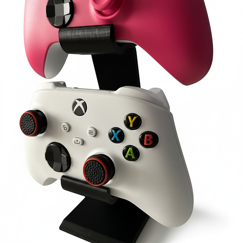 Magicland 3D vertical dual controller stand for Xbox, holding a white and a pink controller.