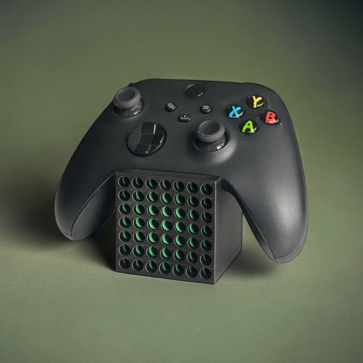 Magicland 3D Xbox Series X controller stand with green accents, black plastic.