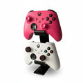 Magicland 3D vertical stand for two Xbox controllers, one pink and one white, on a white background.